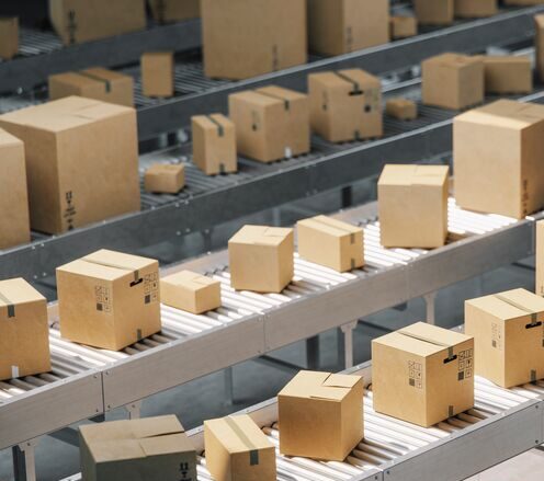 Cardoard-Boxes-on-conveyor-belt-GettyImages-1225833689-Med