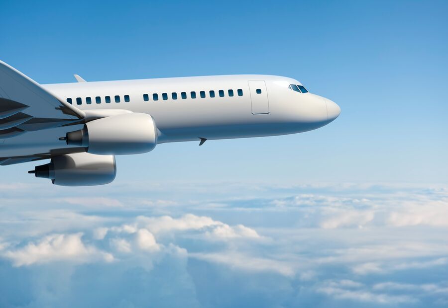 Commercial-airplane-in-flight-GettyImages-155100263-Med
