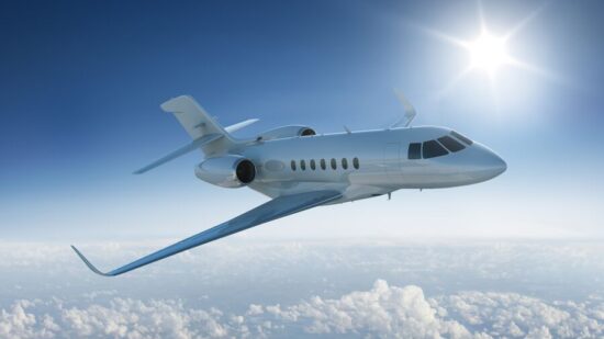 Private-jet-flies-past-sun-GettyImages-466619660-Med